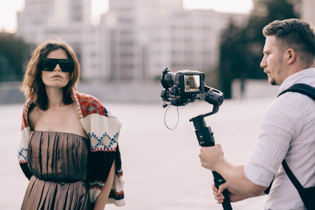 Two business people having a filmed interview conversation